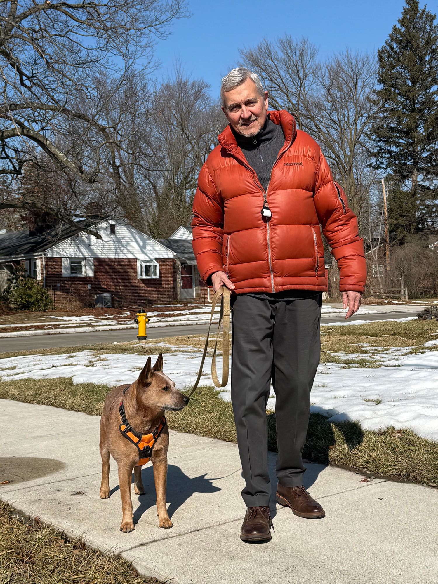 David Karmol walking his dog Reno