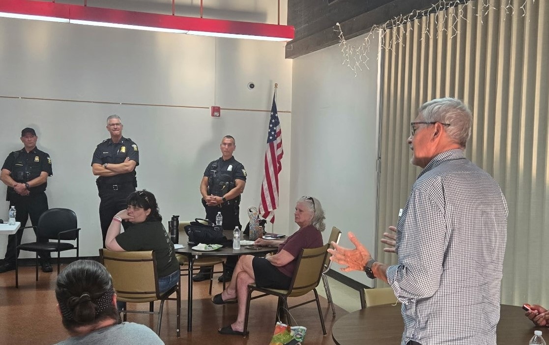 David discusses public safety with the incoming Toledo Chief of Police at a community meeting at the Kahle Center in West Toledo