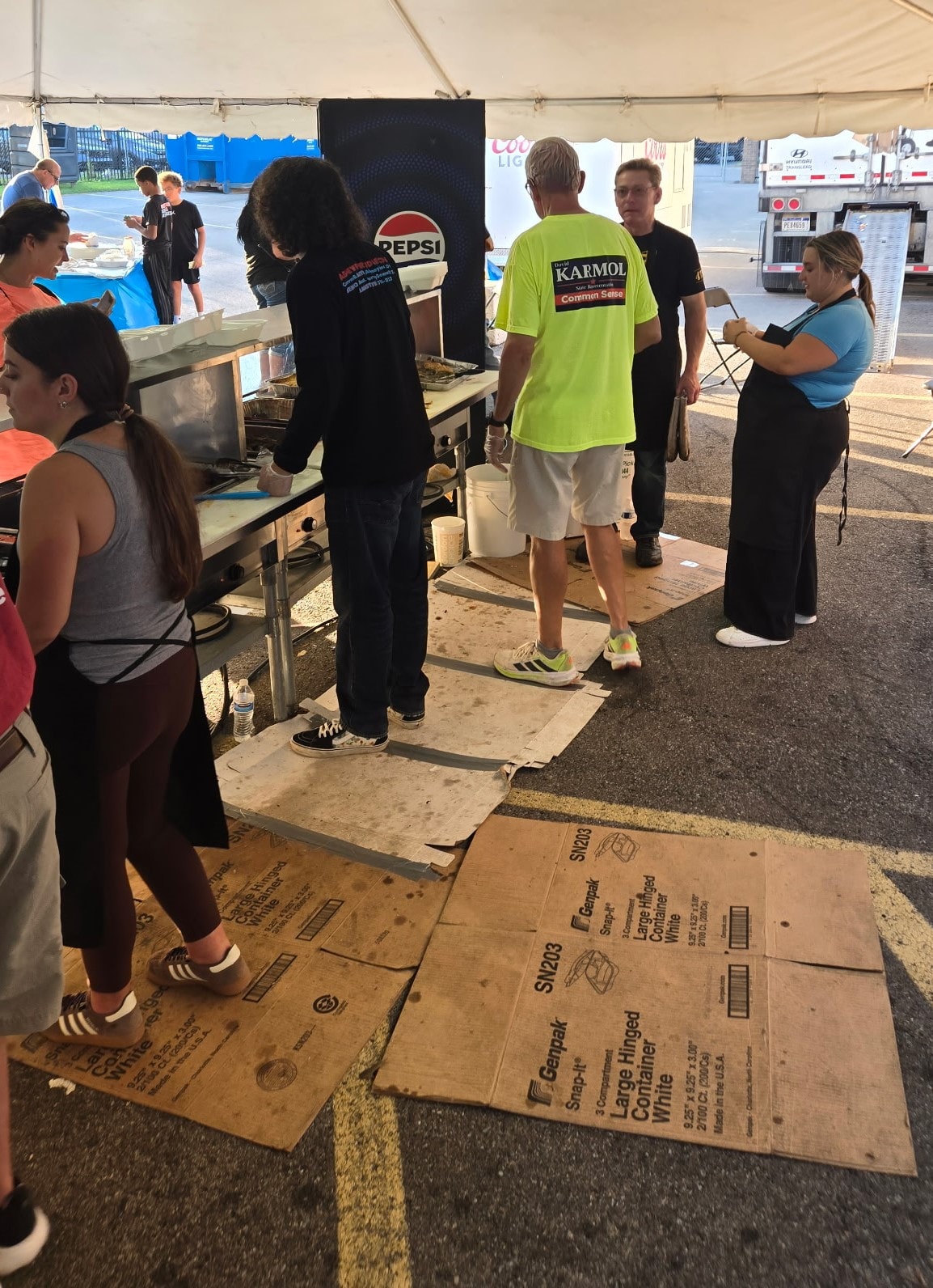 David volunteers at the Toledo Greek-American Festival on the food line